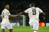 Marcus Rashford (til v.) og Romelu Lukaku scoret målene da Manchester United gikk videre i mesterligaen.