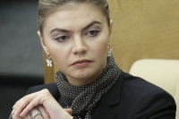 Alina Kabajeva, som tros å være Putins kjæreste, har vunnet gull i rytmisk gymnastikk. Hun ble senere medlem av statsdumaen til Putins parti Det forente Russland. Her avbildet i 2012.